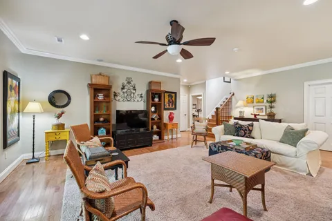 a view of a chairs and table on the wooden deck