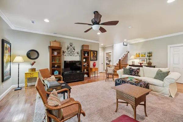 a view of a workspace with furniture and a workspace
