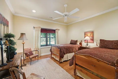 a front view of a house with a yard and a garage