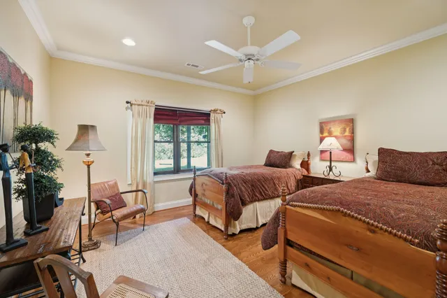 a front view of a house with a yard and a garage