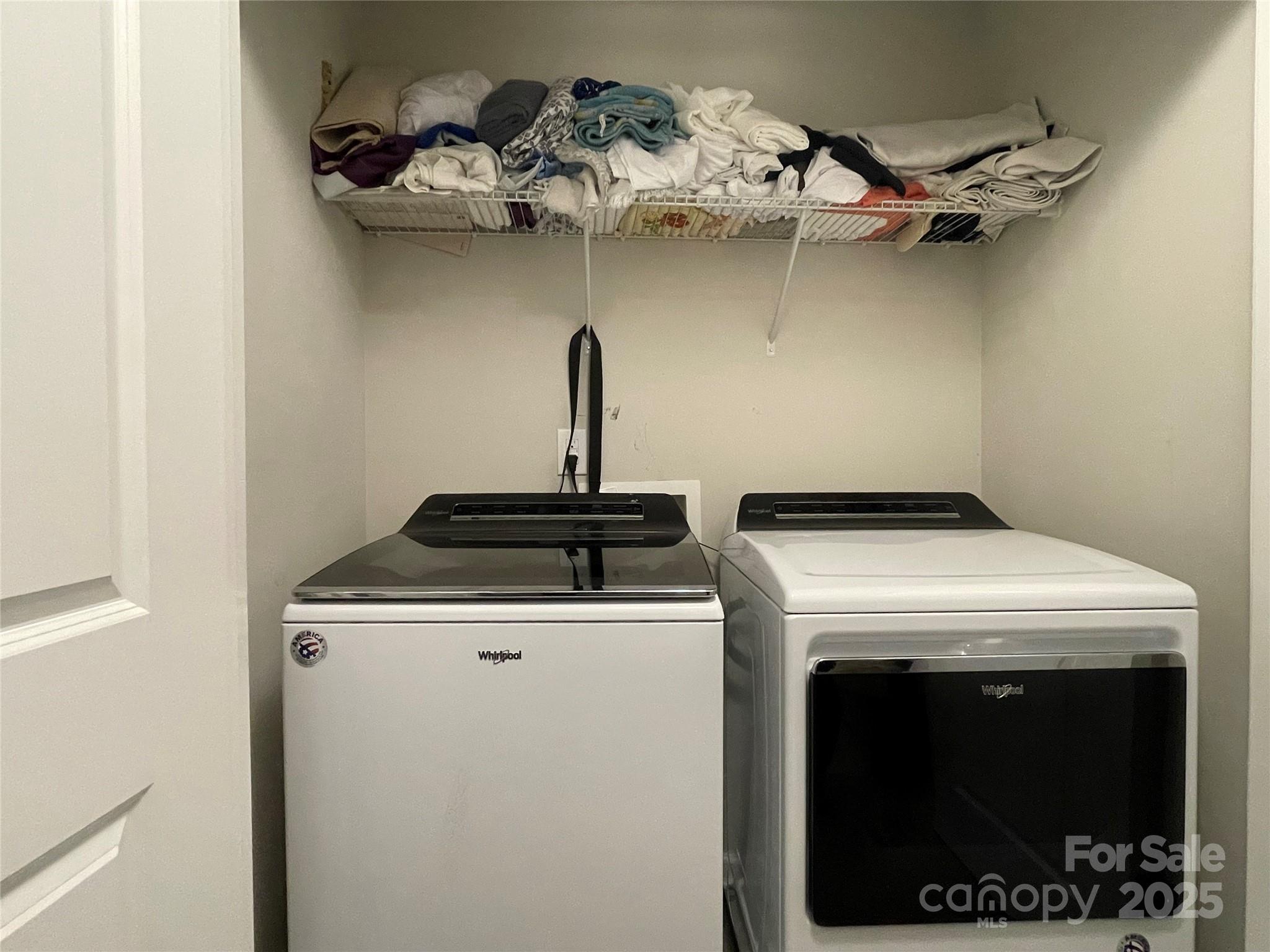 12417 Bryton Ridge Parkway Huntersville, NC 28078 - Photo 13 of 17 a view of a washer and dryer in a utility room