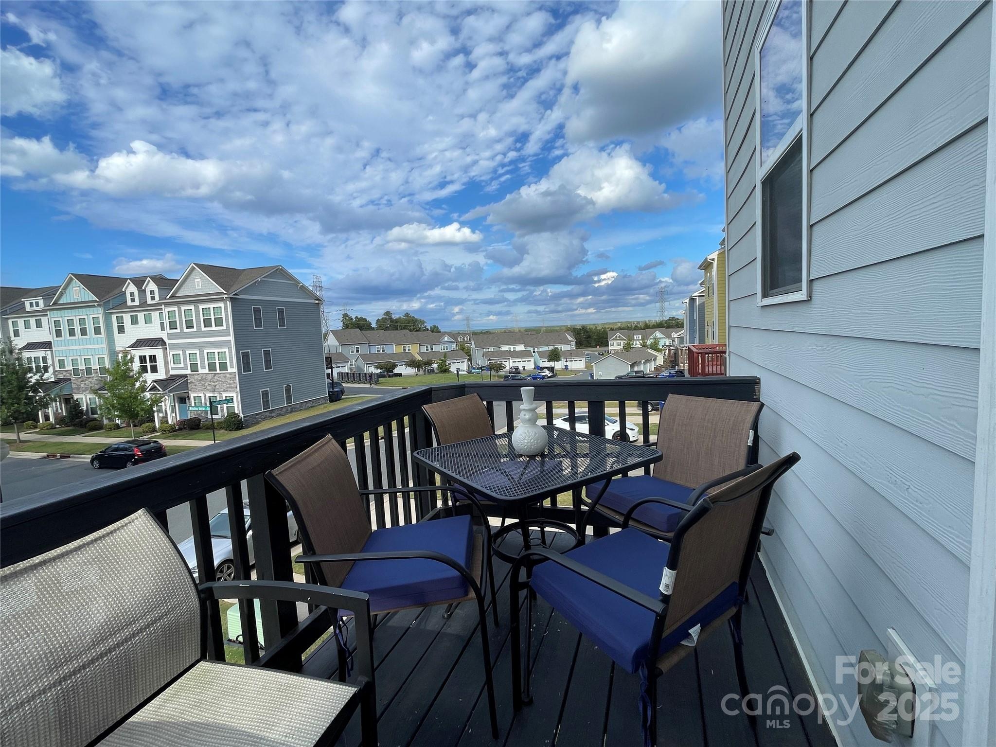 12417 Bryton Ridge Parkway Huntersville, NC 28078 - Photo 17 of 17 a view of a chairs and table on the balcony