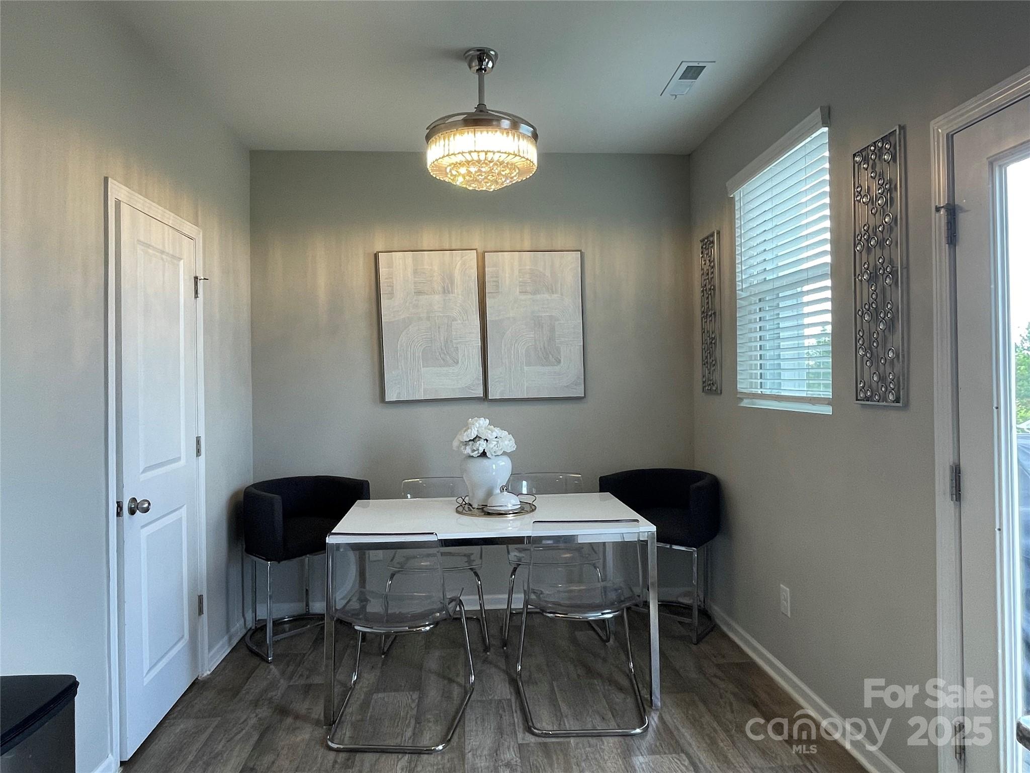 12417 Bryton Ridge Parkway Huntersville, NC 28078 - Photo 7 of 17 a dining room with furniture and window
