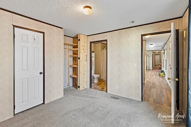 wooden floor and closet in a room