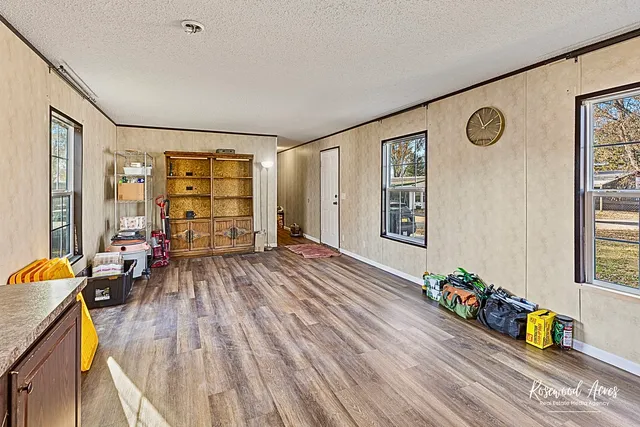 a view of livingroom with furniture and wooden floor