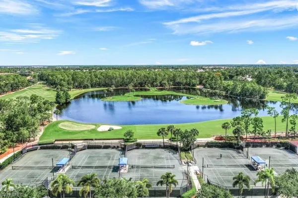 a view of yard with outdoor seating and green space