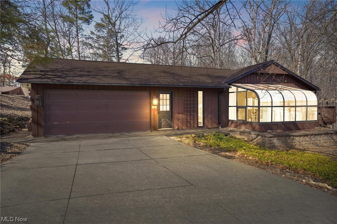 View of front of house with a garage