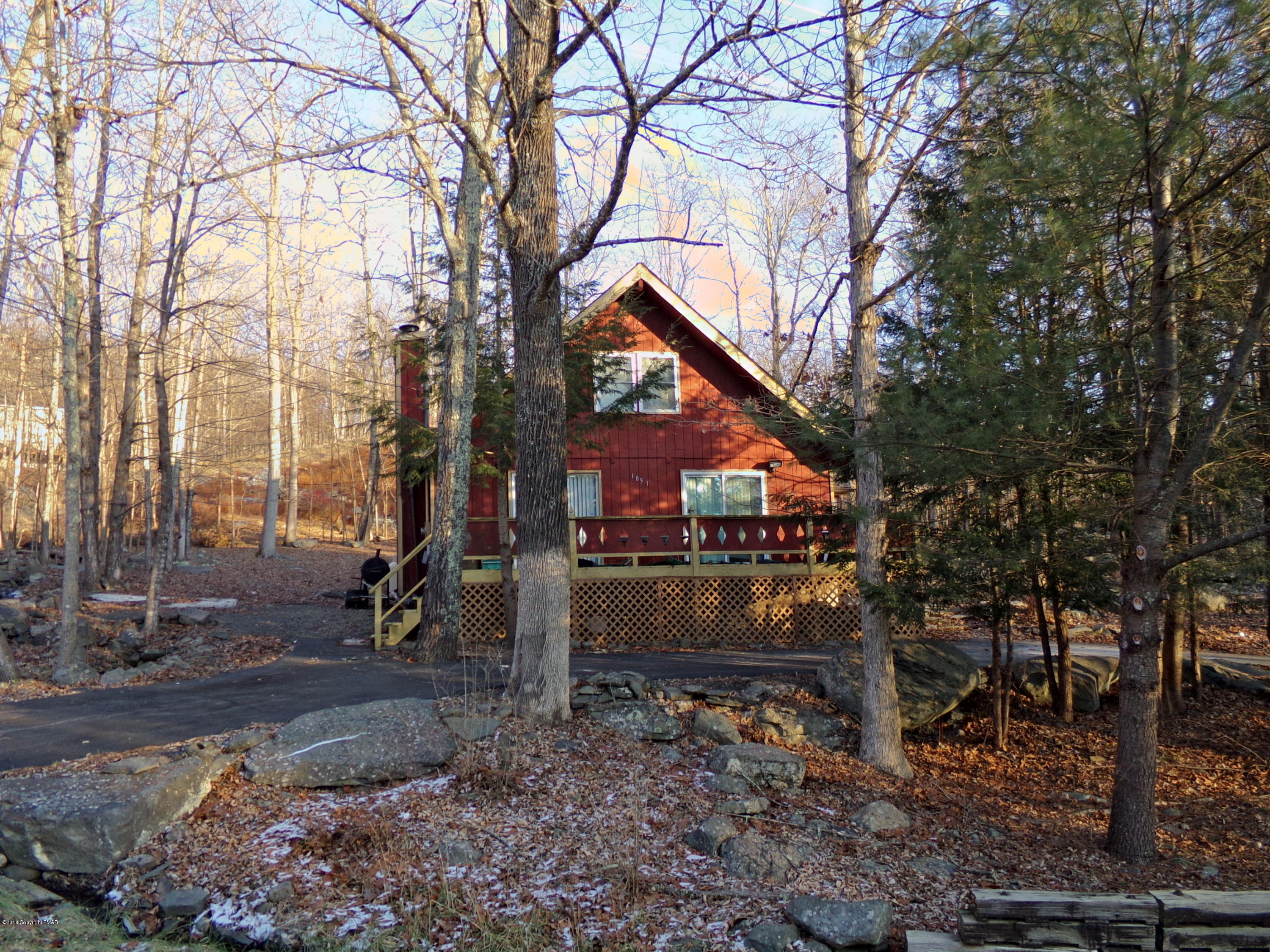 4152 Winchester Way Bushkill, PA 18324 - Photo 1 of 23 a backyard of a house with lots of green space