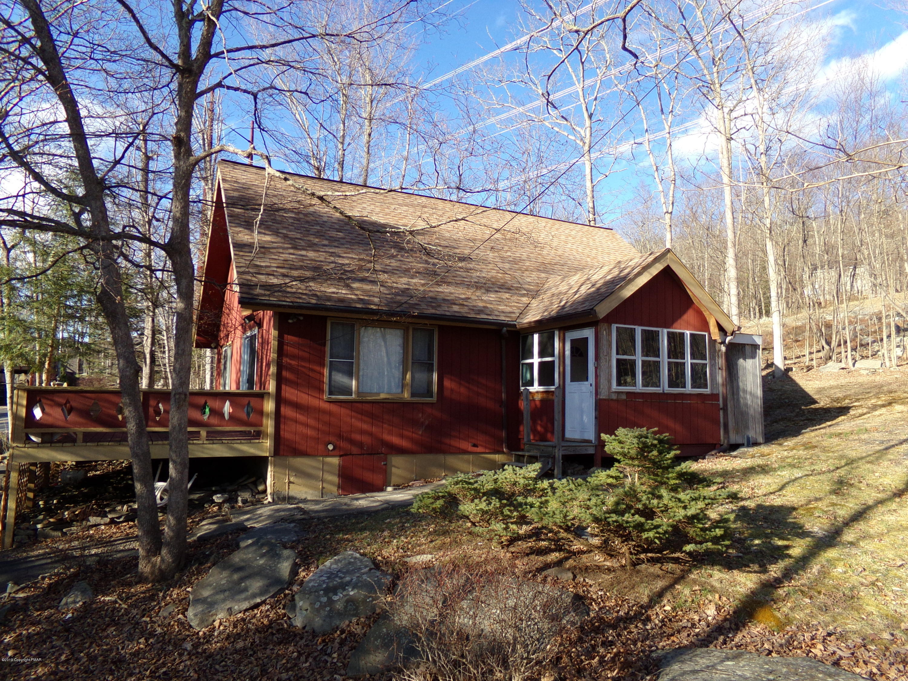 4152 Winchester Way Bushkill, PA 18324 - Photo 2 of 23 a view of a house with a small yard and large tree