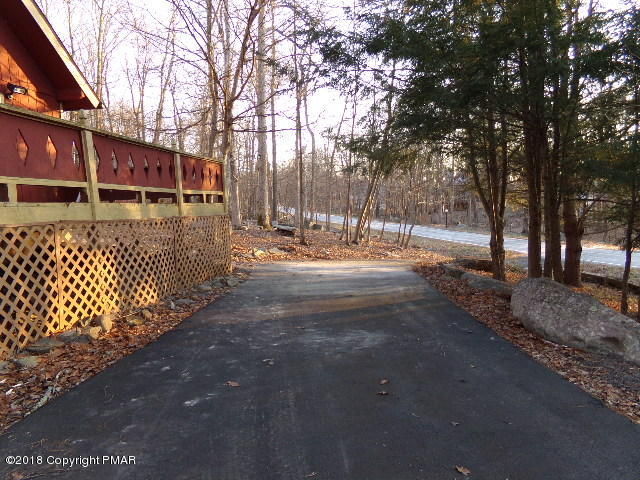 4152 Winchester Way Bushkill, PA 18324 - Photo 23 of 23 a view of a yard with wooden fence