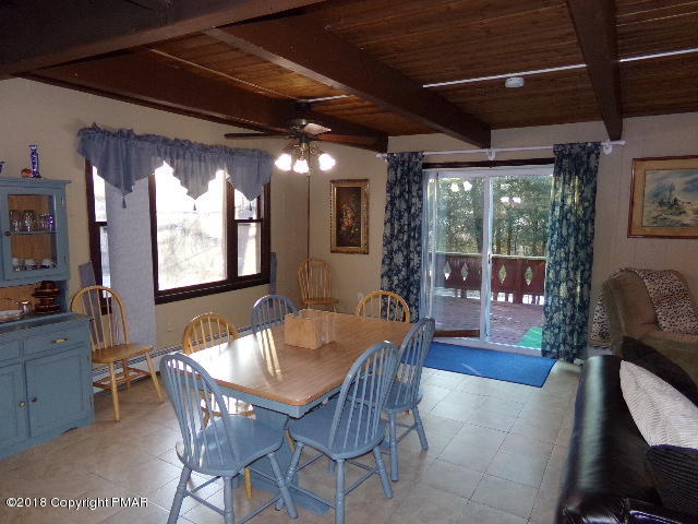 4152 Winchester Way Bushkill, PA 18324 - Photo 6 of 23 a view of a dining room with furniture window and outside view