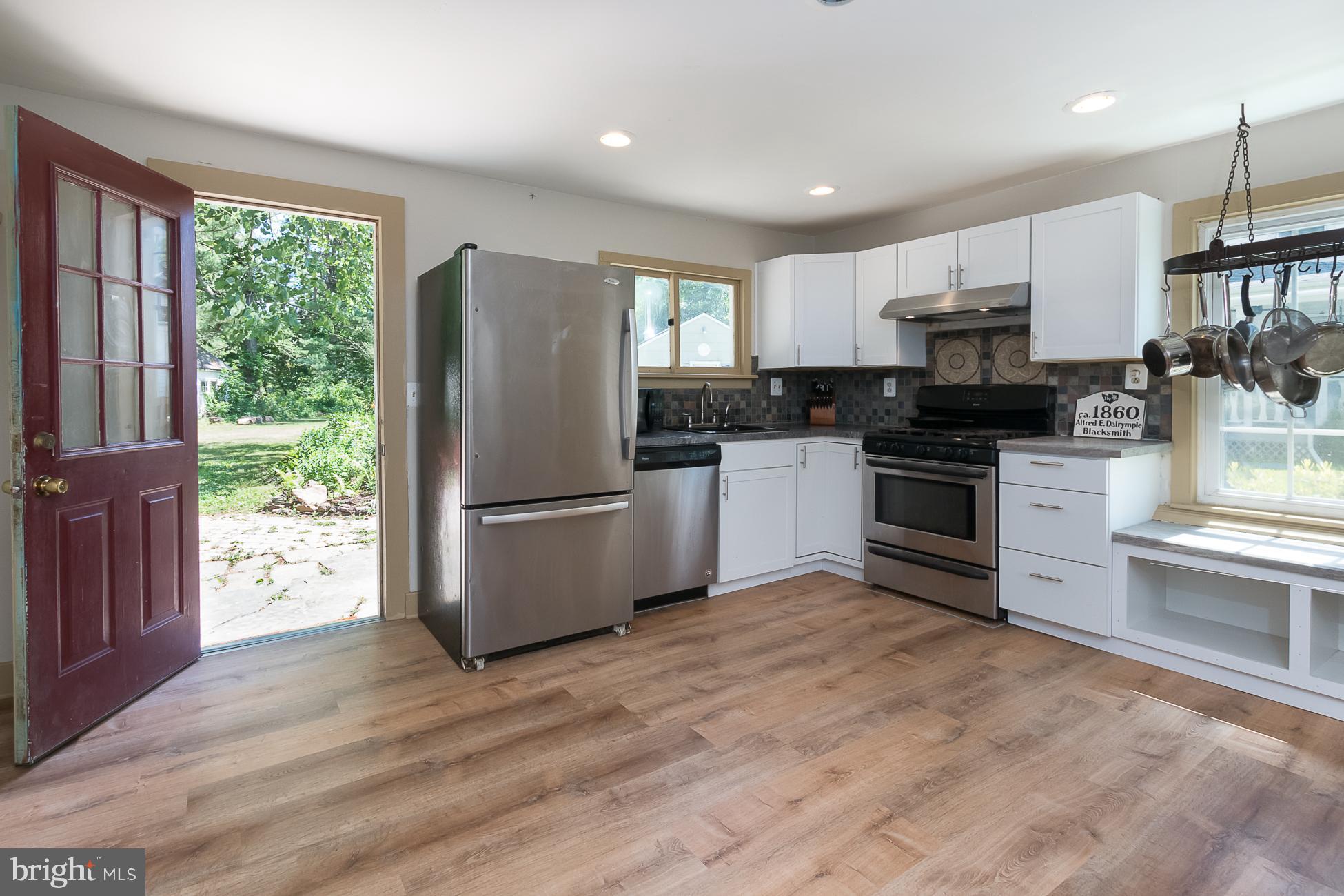 84 Pennington - Hopewell Road Pennington, NJ 08534 - Photo 5 of 26 Kitchen Offers Rear Door Leading Out Onto Terrace