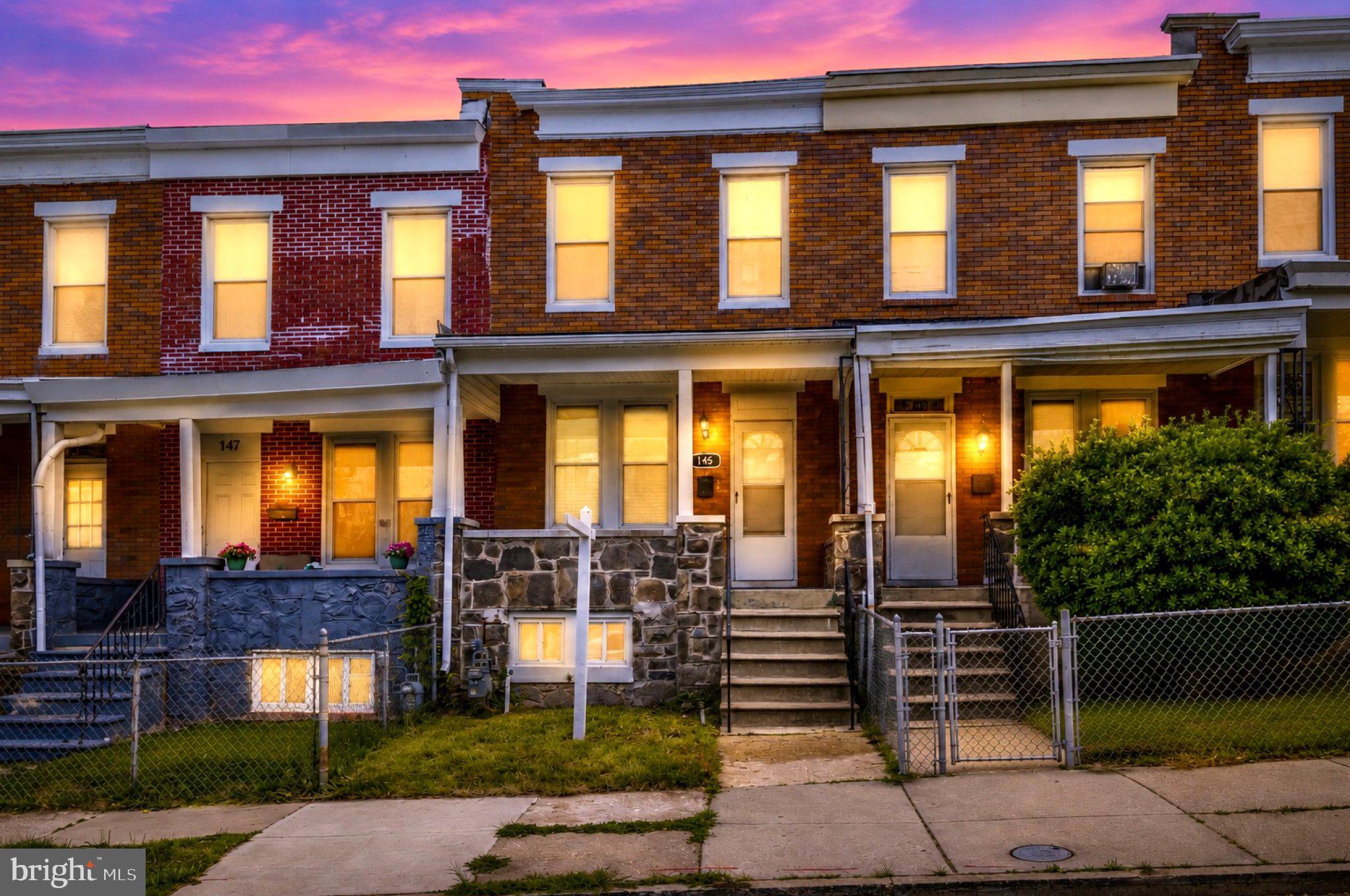 145 North Monastery Avenue Baltimore, MD 21229 - Photo 2 of 45 Charming row homes at sunset glow.