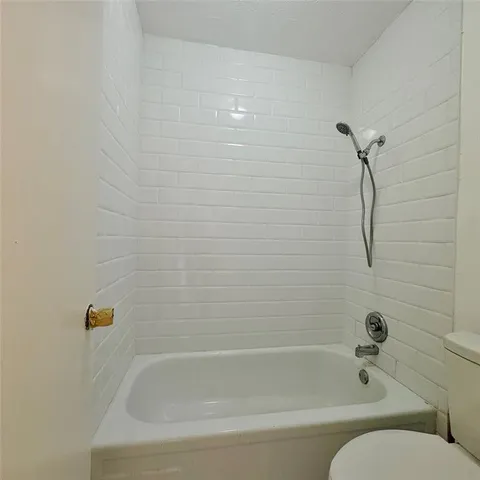 a bathroom with a bathtub