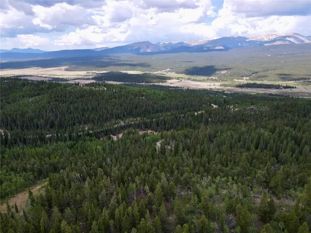 a view of mountain with lake view