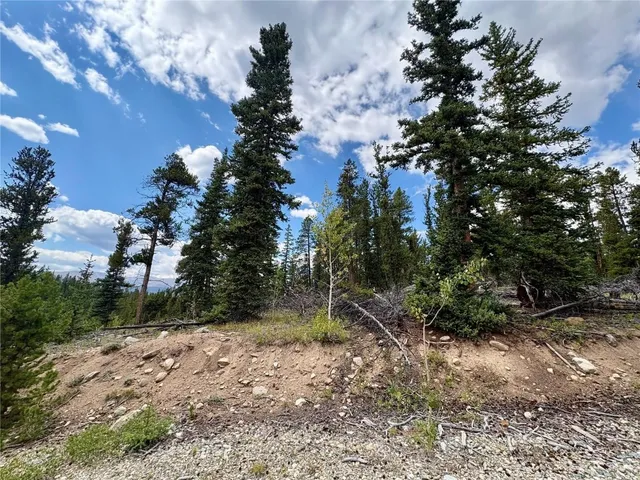 a view of mountains and valleys