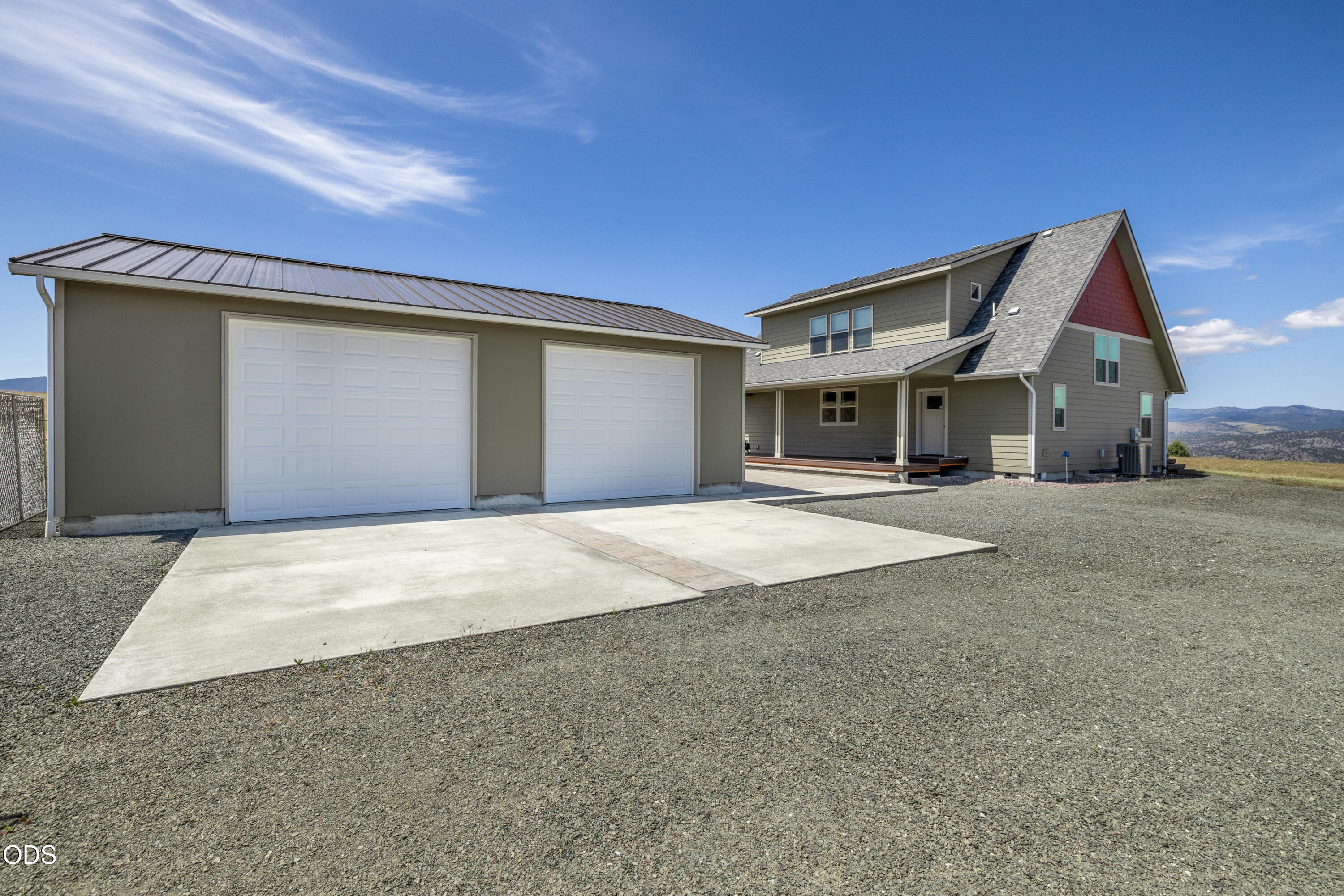 26216 West Bench Road John Day, OR 97845 - Photo 41 of 53 a front view of a house with a garage