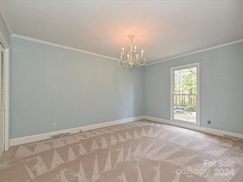3711 High Ridge Road Charlotte, NC 28270 - Photo 28 of 39 a view of an empty room with a window