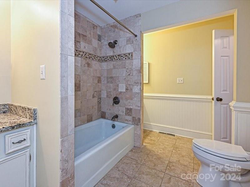 3711 High Ridge Road Charlotte, NC 28270 - Photo 31 of 39 a bathroom with a bathtub and a shower