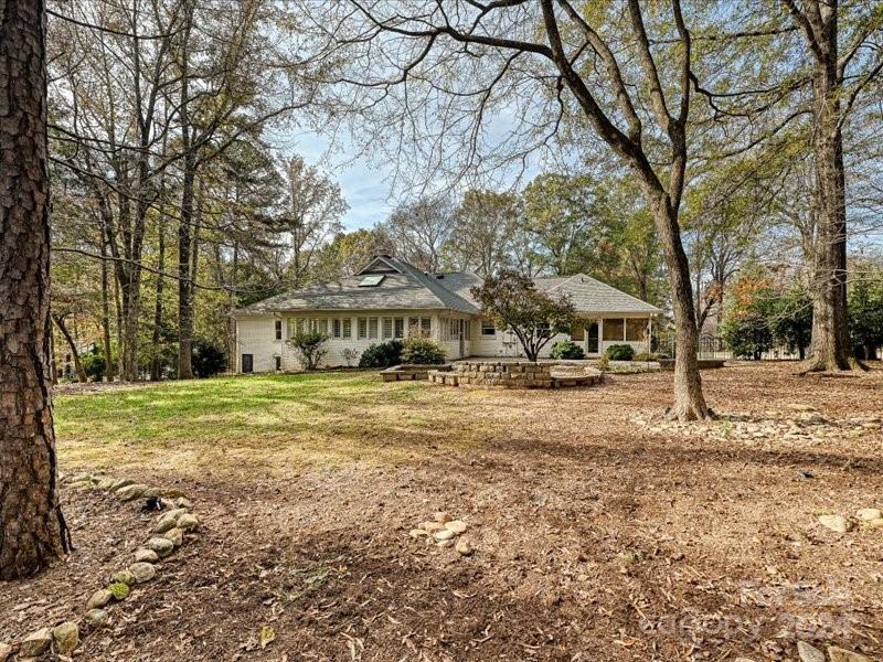 3711 High Ridge Road Charlotte, NC 28270 - Photo 35 of 39 a view of a house with yard and sitting area