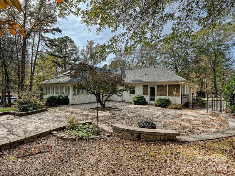 3711 High Ridge Road Charlotte, NC 28270 - Photo 37 of 39 a front view of a house with a yard
