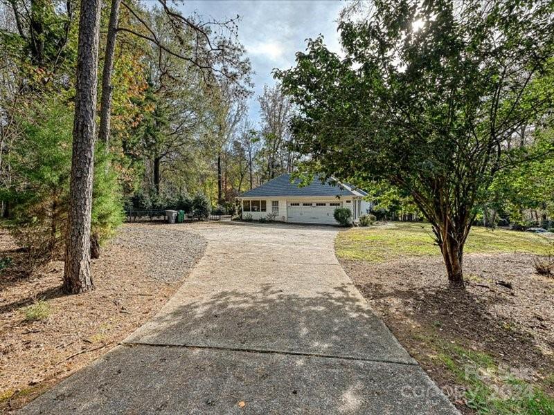 3711 High Ridge Road Charlotte, NC 28270 - Photo 39 of 39 a view of a yard with large trees