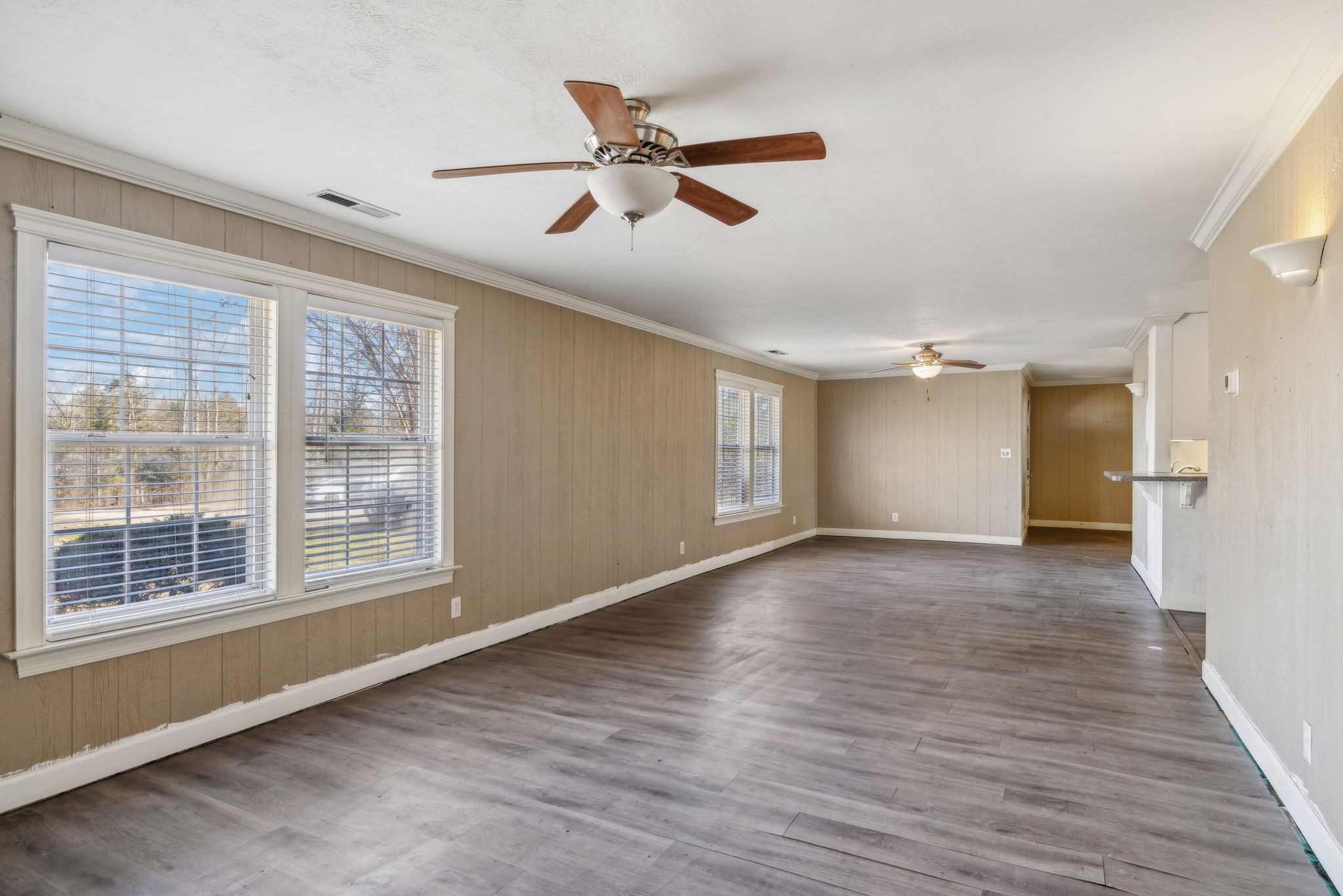 2185 Joe Brown Road Spring Hill, TN 37174 - Photo 15 of 96 a view of an empty room with wooden floor and a window