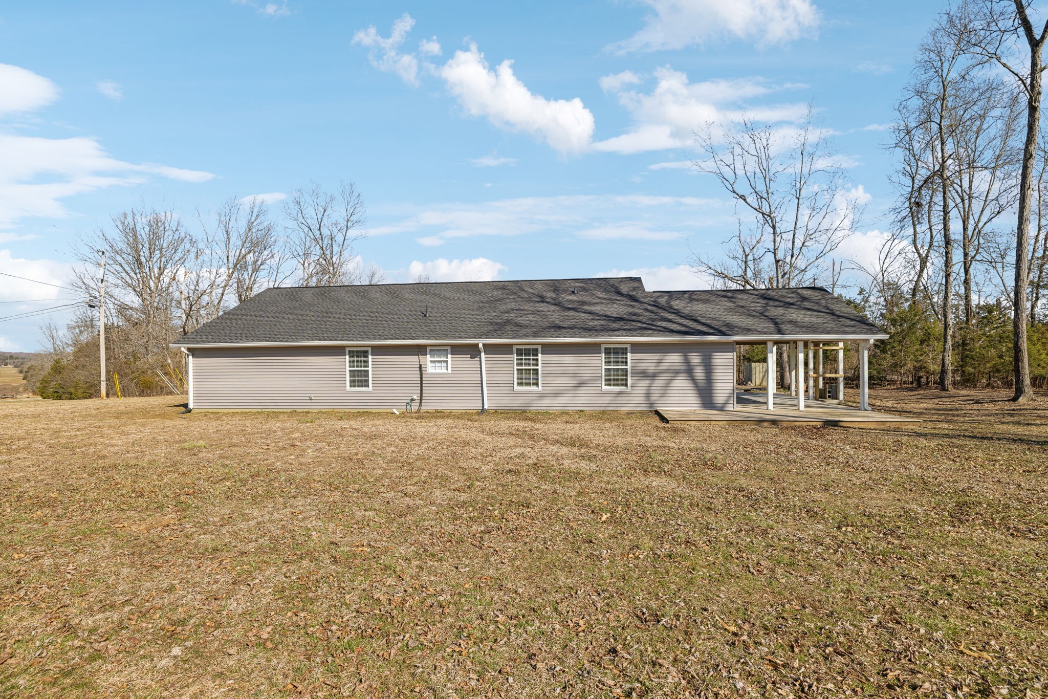 2185 Joe Brown Road Spring Hill, TN 37174 - Photo 42 of 96 a front view of a house with a garden