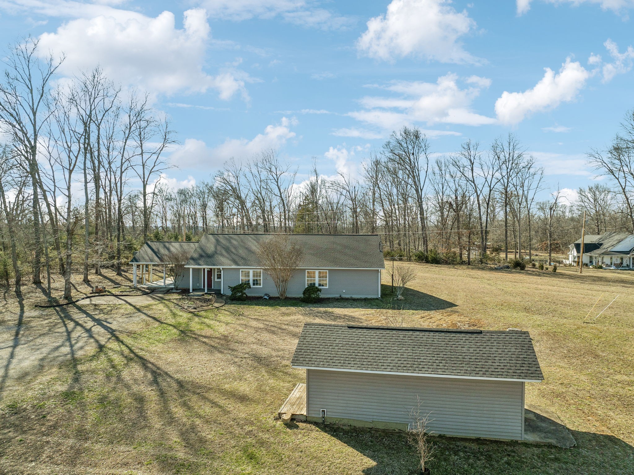 2185 Joe Brown Road Spring Hill, TN 37174 - Photo 63 of 96 a view of yard with swimming pool and trees