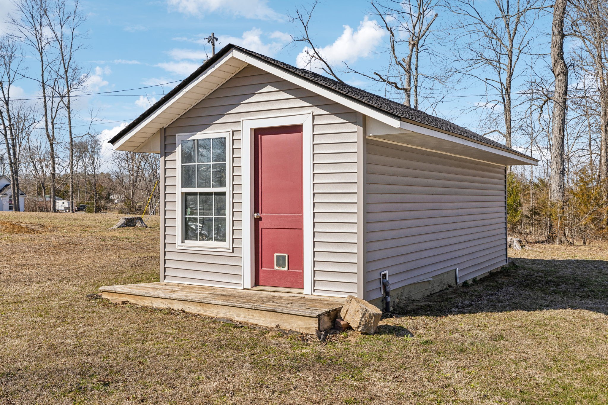 2185 Joe Brown Road Spring Hill, TN 37174 - Photo 70 of 96 a front view of a house with a yard