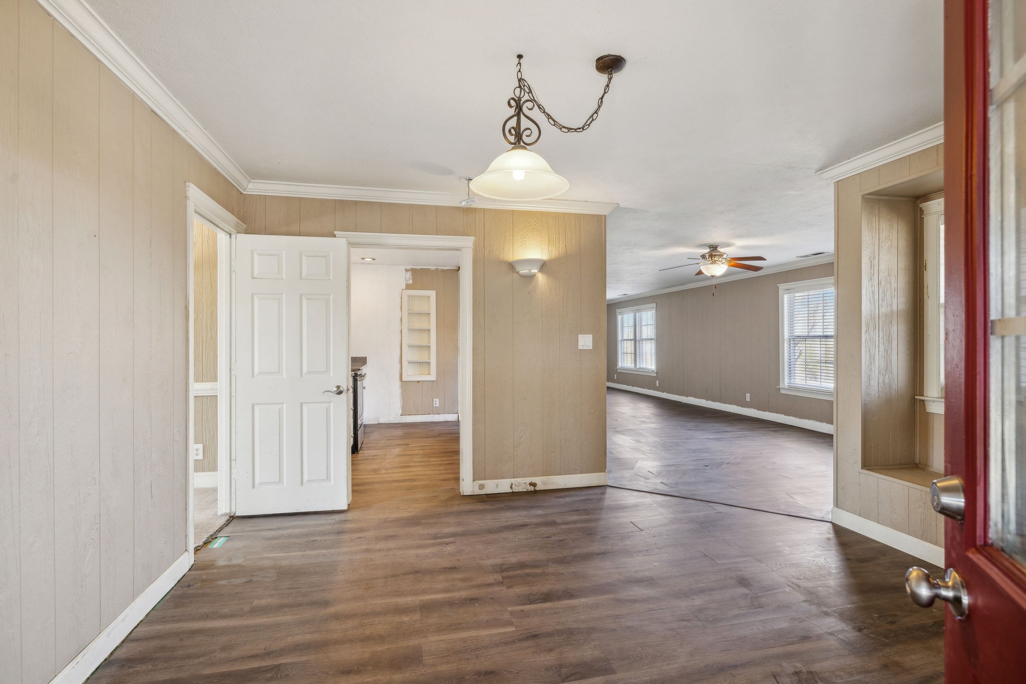 2185 Joe Brown Road Spring Hill, TN 37174 - Photo 8 of 96 a view of a livingroom with wooden floor and staircase