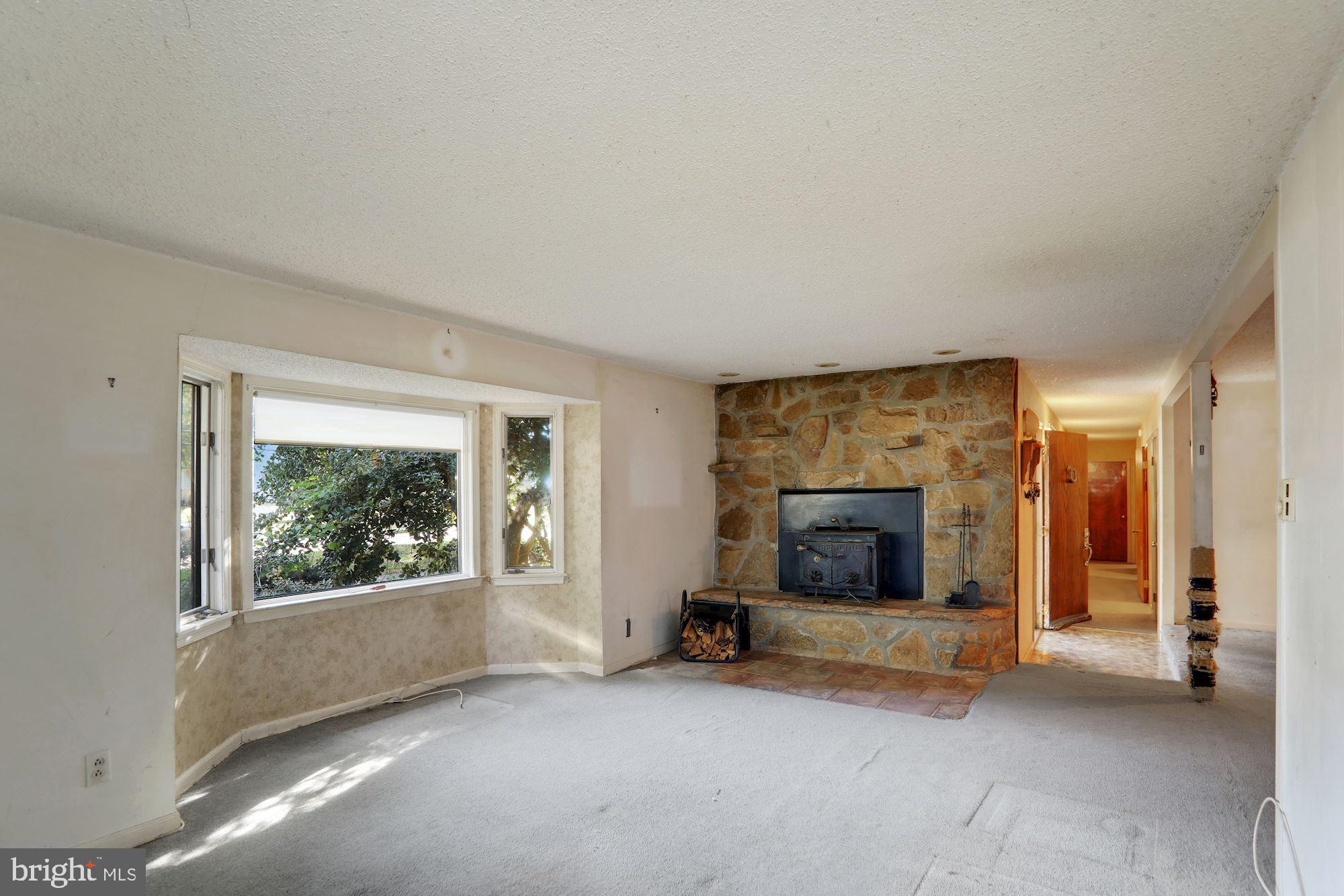 1224 Clements Bridge Road Woodbury, NJ 08096 - Photo 6 of 26 with feature wall...paint and flooring to bring it