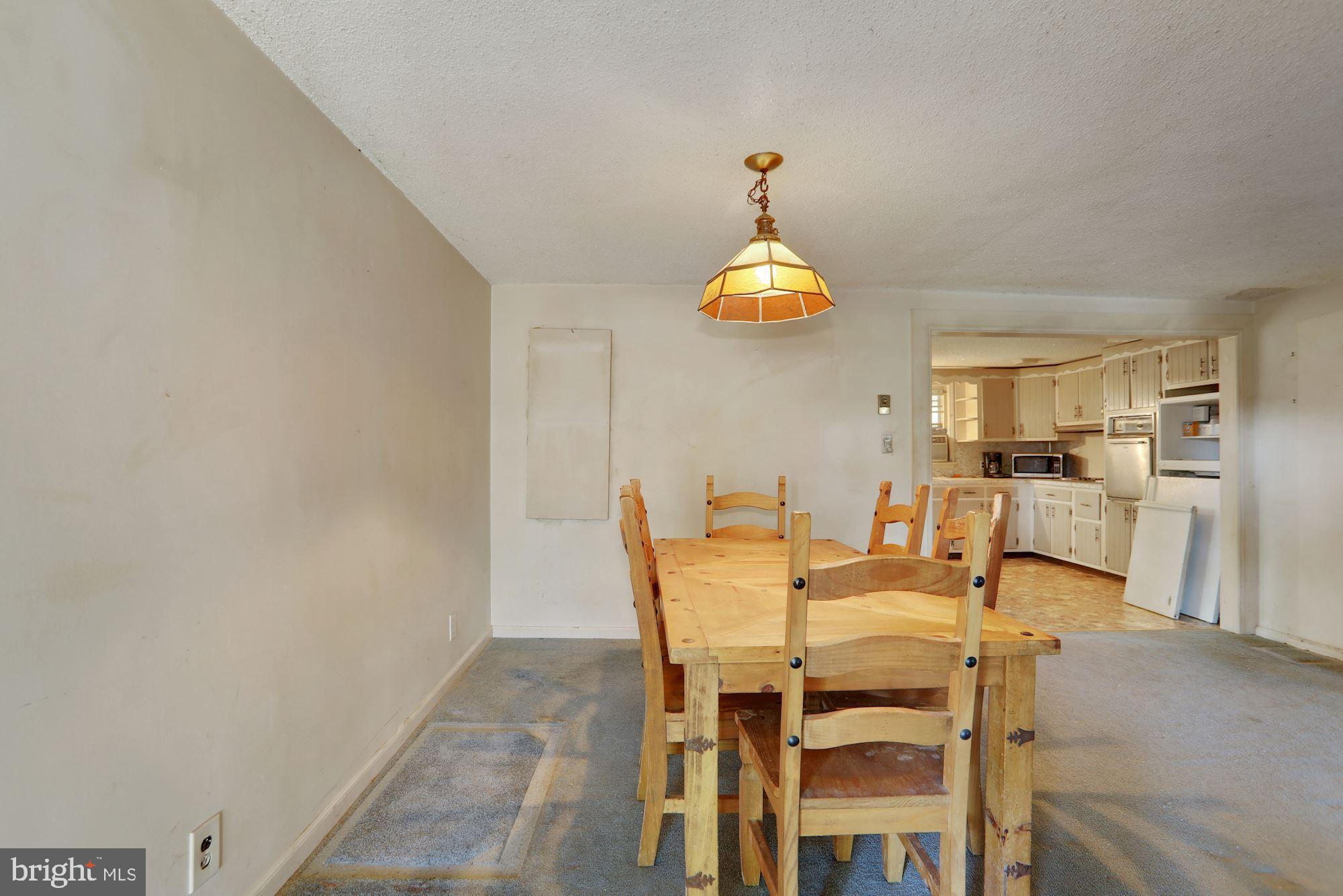 1224 Clements Bridge Road Woodbury, NJ 08096 - Photo 10 of 26 dining is open to kitchen which is