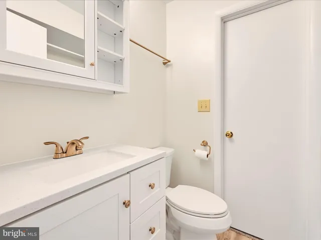 a kitchen with stainless steel appliances granite countertop a stove and a refrigerator