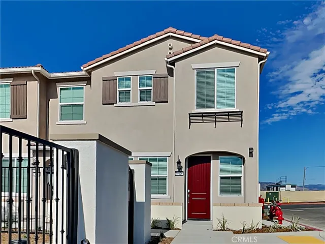 a front view of a house with entertaining space