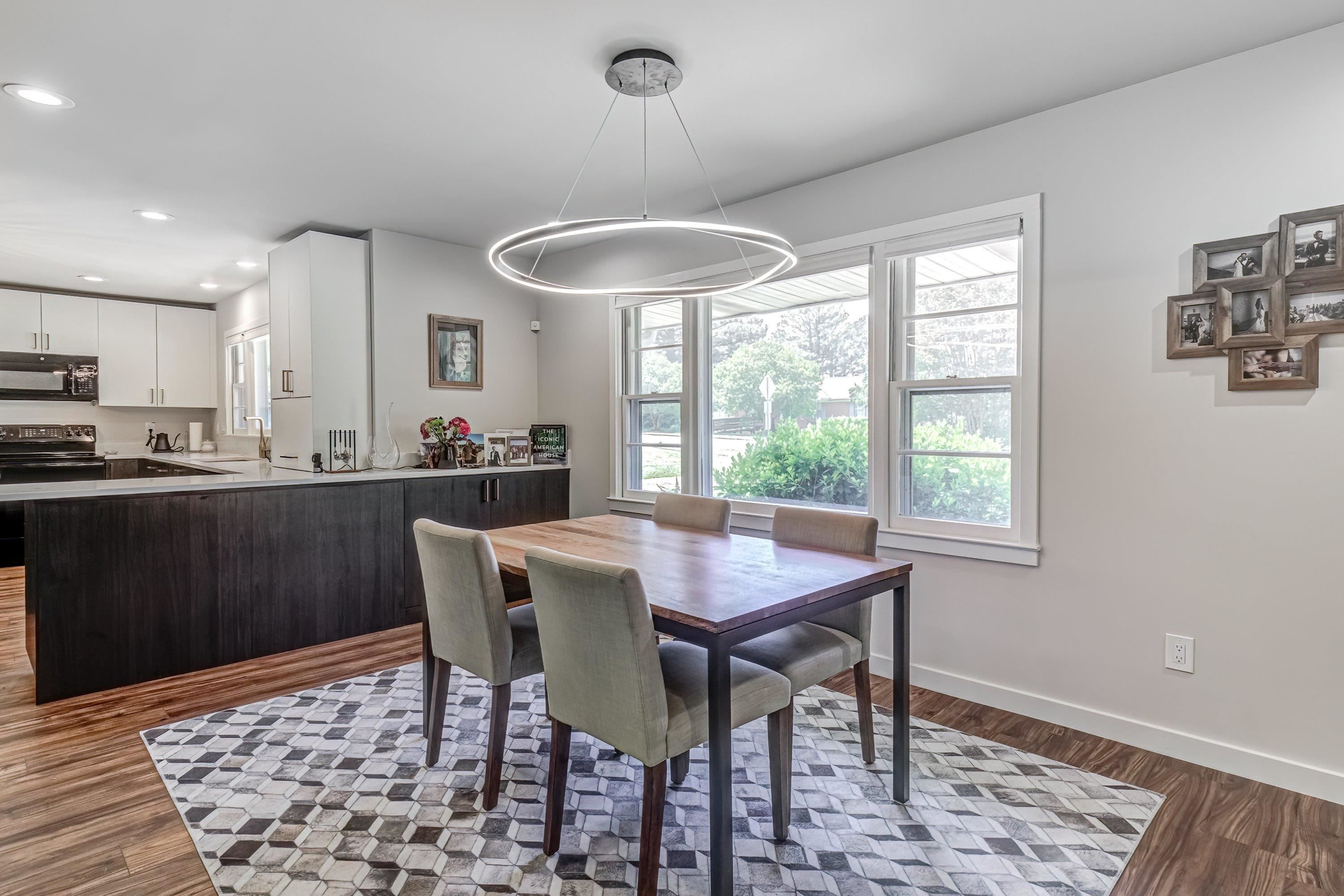 2405 Brenda Drive Raleigh, NC 27610 - Photo 8 of 27 a dining room with a table and chairs