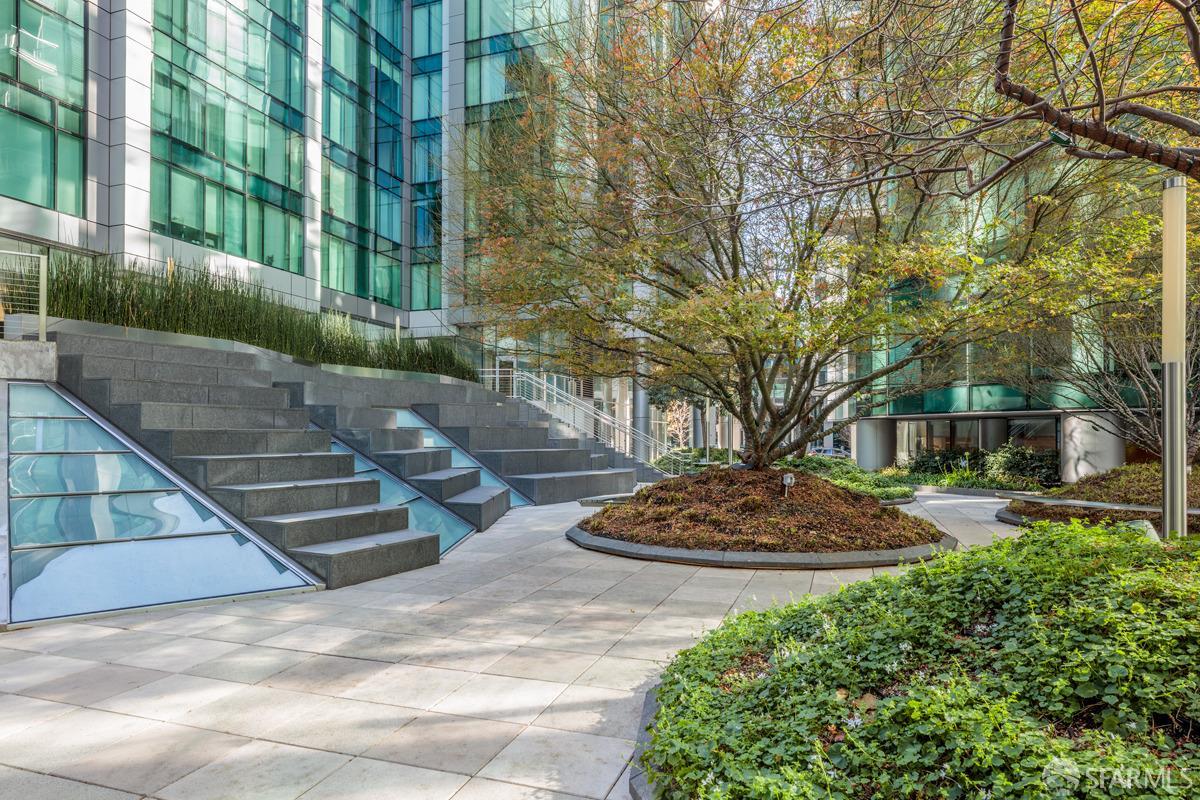 333 Main Street, Unit 4M San Francisco, CA 94105 - Photo 18 of 39 a view of a fountain with brick walls