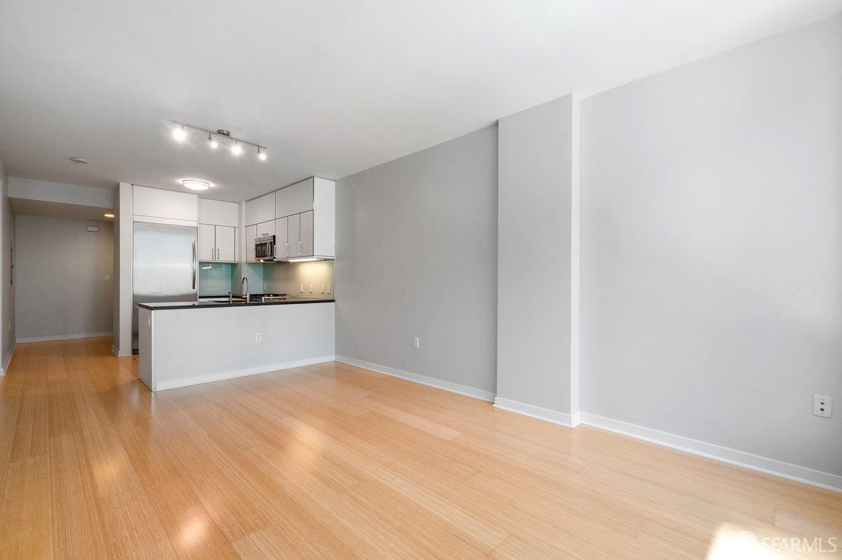 333 Main Street, Unit 4M San Francisco, CA 94105 - Photo 4 of 39 a view of kitchen with wooden floor