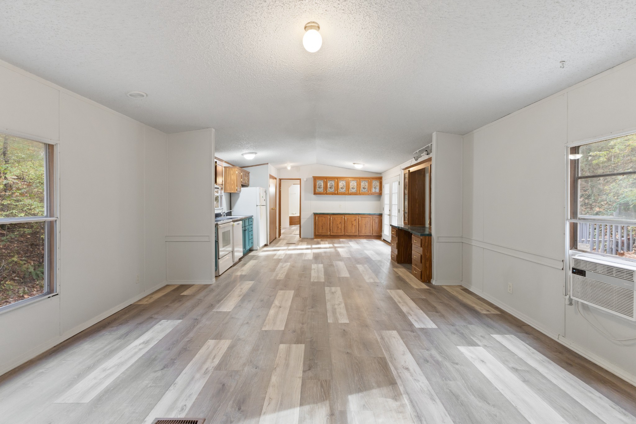8552 Cub Creek Road Nashville, TN 37209 - Photo 34 of 45 a big room with wooden floor and windows