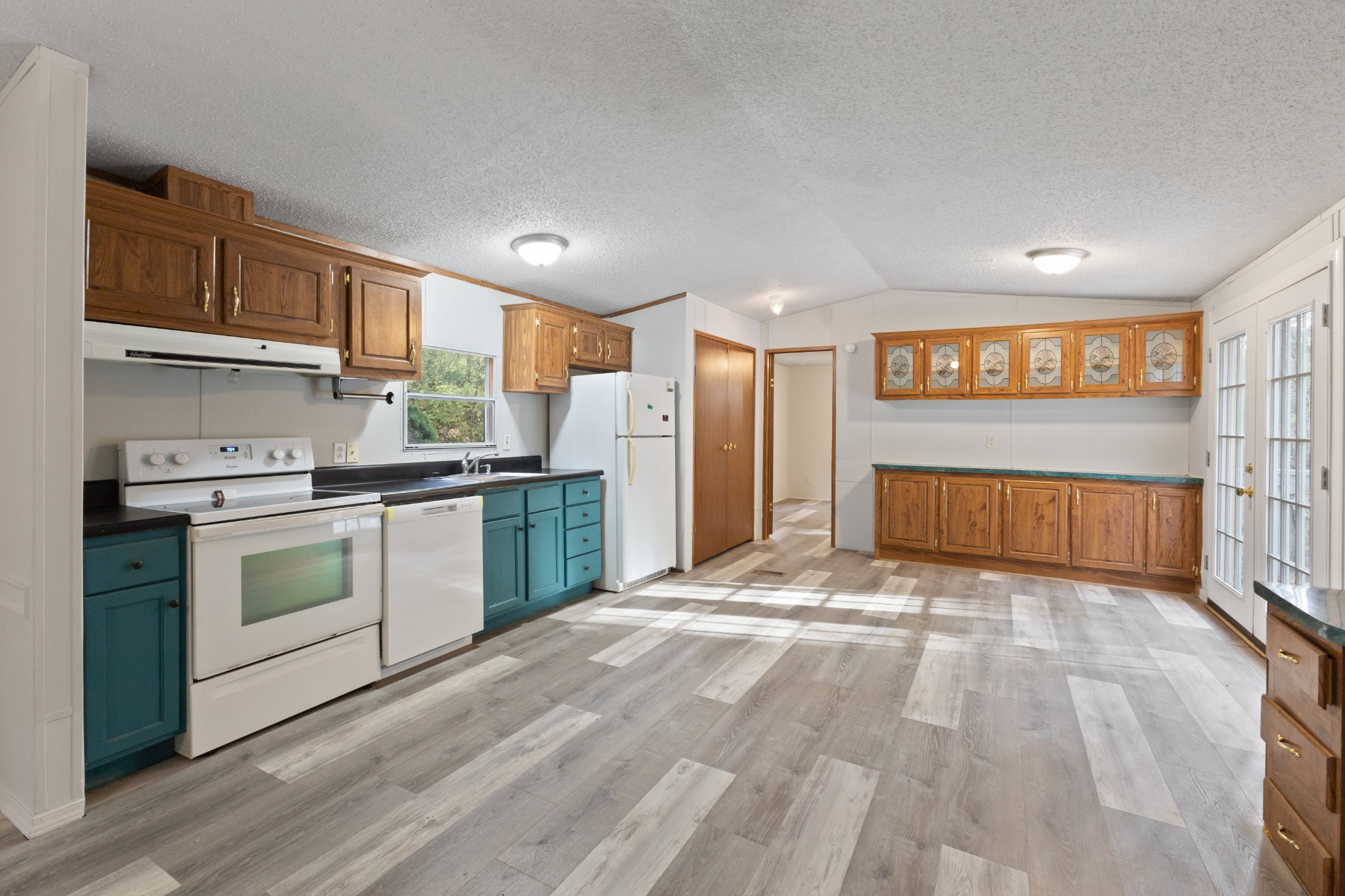 8552 Cub Creek Road Nashville, TN 37209 - Photo 35 of 45 a kitchen with stainless steel appliances granite countertop a refrigerator sink and stove