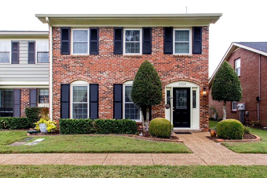 1323 General George Patton Road Nashville, TN 37221 - Photo 2 of 30 a view of a brick house with a yard