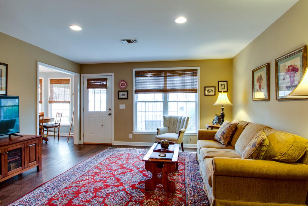 1323 General George Patton Road Nashville, TN 37221 - Photo 11 of 30 a living room with furniture and wooden floor