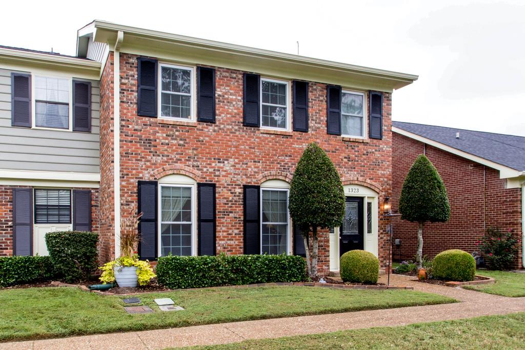 1323 General George Patton Road Nashville, TN 37221 - Photo 3 of 30 a front view of a house with garden