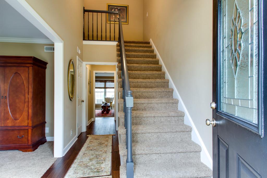 1323 General George Patton Road Nashville, TN 37221 - Photo 4 of 30 a view of a hallway with staircase