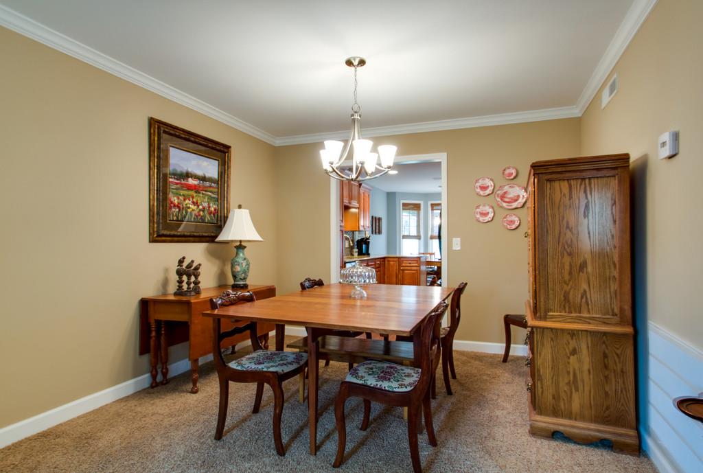 1323 General George Patton Road Nashville, TN 37221 - Photo 8 of 30 a dining room with furniture and window