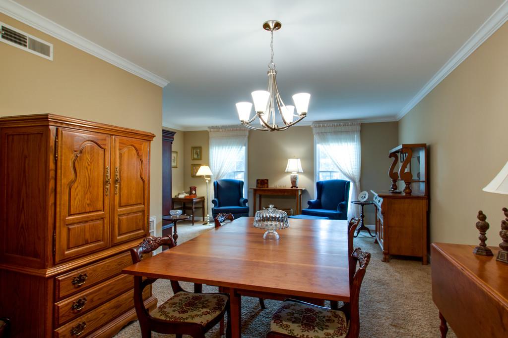 1323 General George Patton Road Nashville, TN 37221 - Photo 10 of 30 a view of a dining room with furniture and chandelier