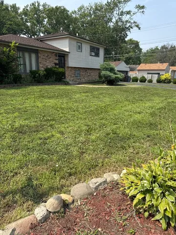 a bathroom with a sink and a yard