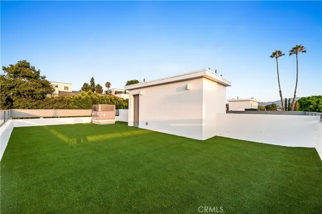 a view of a back yard with an outdoor space