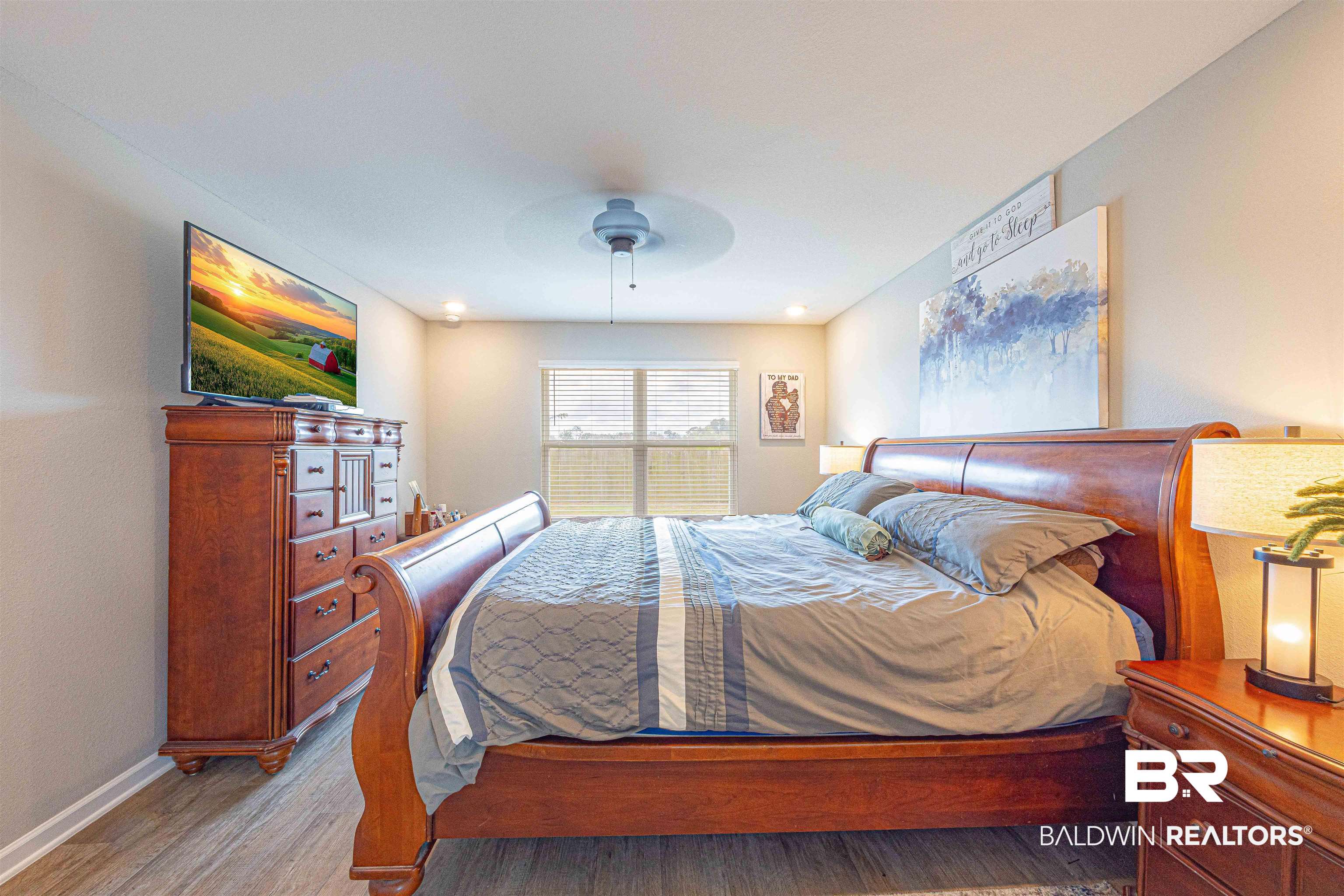 14843 Forsythia Loop Silverhill, AL 36576 - Photo 22 of 51 Bedroom featuring light wood-type flooring and ceiling fan