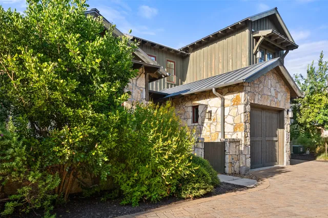 a view of a chairs and table in the patio